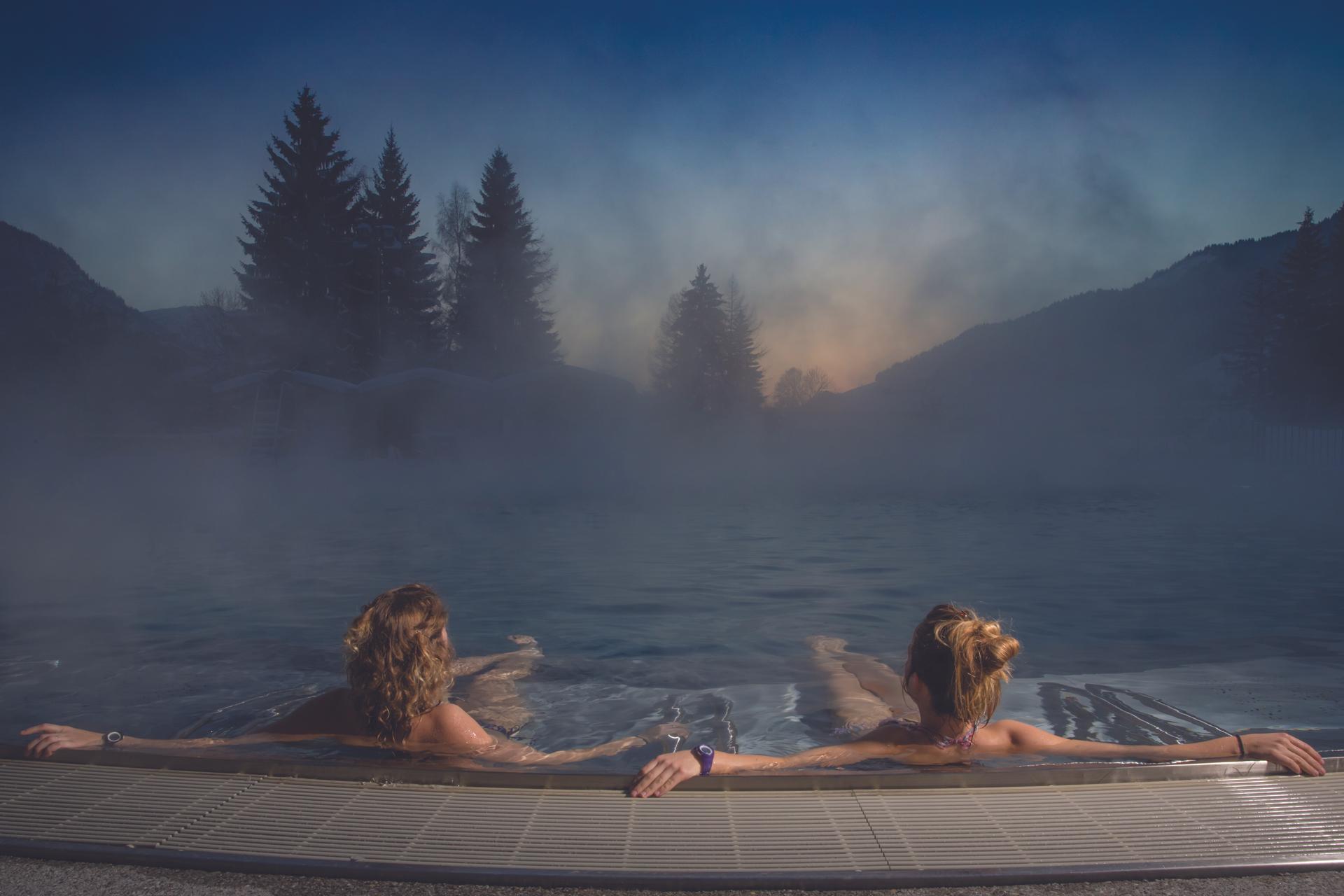 Couple enjoying thermal spa hot tub at Megeve ski resort